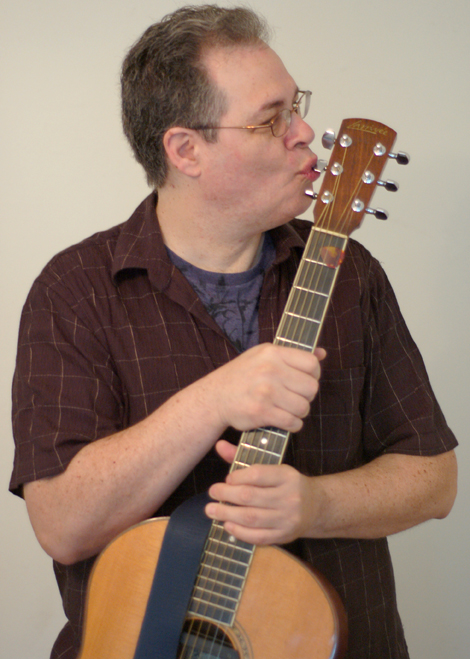 kenny kissing the guitar